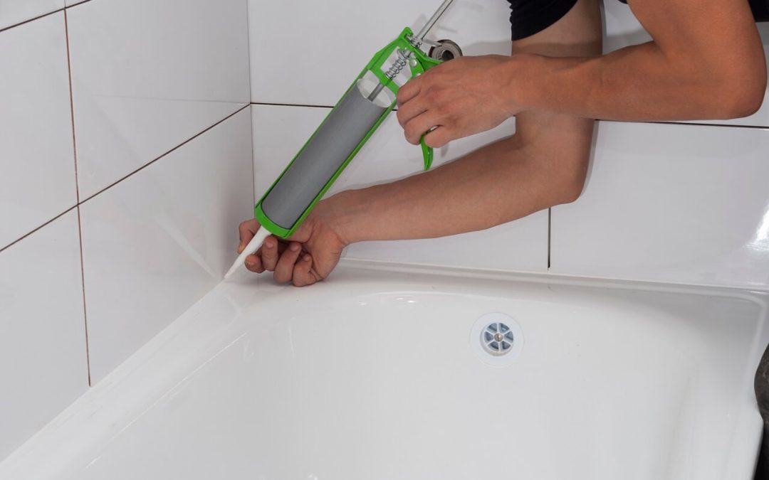 Prevent water leaks and mold in the home by sealing cracks around the tub.